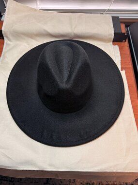 black wide-brim fedora hat